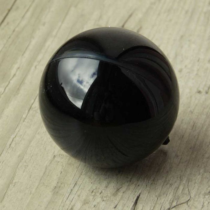 Sphère en plexiglass noir brillant 7 cm vue de face