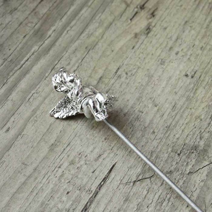 Cupidon argenté sur pique de bois
